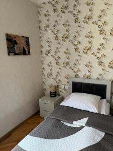 Postel nebo postele na pokoji v ubytování guest house TMT