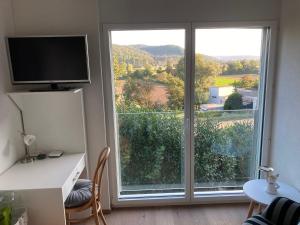 Nespecifikovaný výhled na hory nebo výhled na hory při pohledu z apartmánu