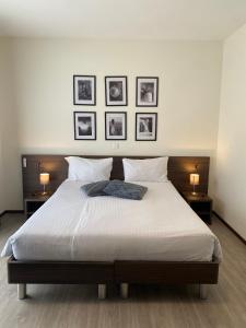 Ένα ή περισσότερα κρεβάτια σε δωμάτιο στο Hotel Locanda dei Mulini