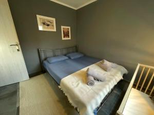 Postel nebo postele na pokoji v ubytování MK Residences