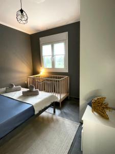 Postel nebo postele na pokoji v ubytování MK Residences