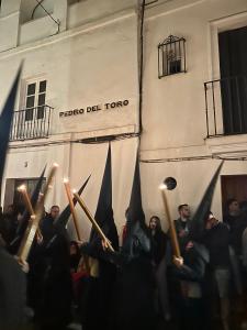 a group of people with their hands in the air with torches at REY DE SEVILLA FLATS - Duplex Museo in Seville