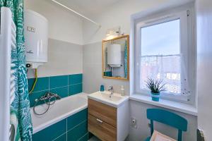 Kúpeľňa v ubytovaní Market Apartman Sopron + 9 fotografií