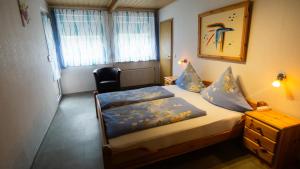 Posteľ alebo postele v izbe v ubytovaní Ferienwohnung und Gästezimmer Reis-Kohl