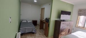 Postel nebo postele na pokoji v ubytování Departamento de 1 ambiente.