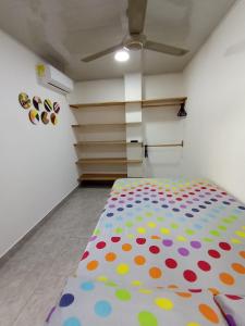 Postel nebo postele na pokoji v ubytování Apartamento Esmeralda Arboletes