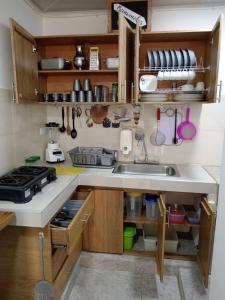 Kuchyň nebo kuchyňský kout v ubytování Apartamento Esmeralda Arboletes