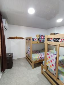 Postel nebo postele na pokoji v ubytování Apartamento Esmeralda Arboletes