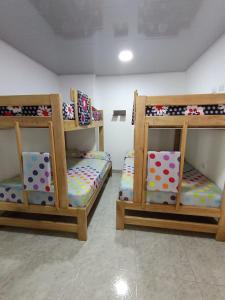 Postel nebo postele na pokoji v ubytování Apartamento Esmeralda Arboletes