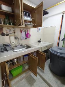 Kuchyň nebo kuchyňský kout v ubytování Apartamento Esmeralda Arboletes
