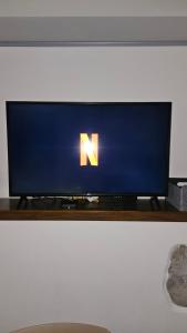 TV a/nebo společenská místnost v ubytování La Stanzina di via Dosso + 4 fotografie