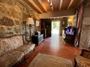 Μια τηλεόραση ή/και κέντρο ψυχαγωγίας στο Casa da Mena - Casa de Campo no Caramulo