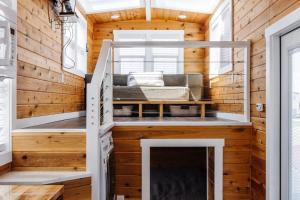 a tiny house with a bunk bed in it at Pet-Friendly Family Escape, Near Zion in Apple Valley