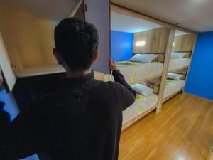 Postel nebo postele na pokoji v ubytování Golden Rest Latacunga