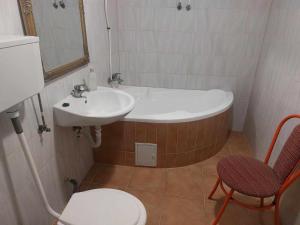 Ванная комната в Rózsás Motel