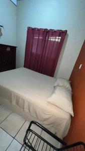 Кровать или кровати в номере Acogedor Depto 2 Rec. 1 Baño, Cocina Equip