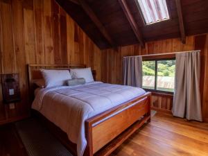 Postel nebo postele na pokoji v ubytování Mountain Wonders Chalet