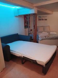 Postel nebo postele na pokoji v ubytování Ferienwohnung in Bühler nähe Appenzell