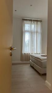 Säng eller sängar i ett rum på Stilvolle Luxus City-Apartment