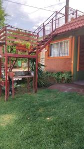 Zahrada ubytování Lo de Lili Departamentos Mina Clavero + 26 fotografií