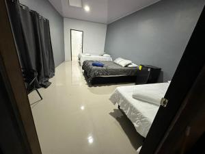 Cama o camas de una habitación en Manuel Antonio Inn Paradise
