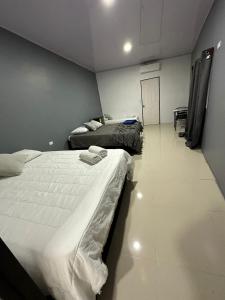 Cama ou camas em um quarto em Manuel Antonio Inn Paradise
