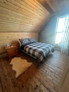 Ein Bett oder Betten in einem Zimmer der Unterkunft Chalet Le Verdier