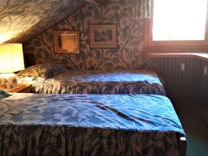 Uma cama ou camas num quarto em Appartement Méribel, 3 pièces, 5 personnes - FR-1-180-614
