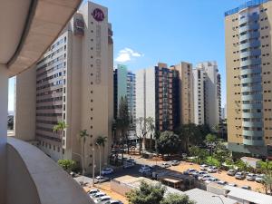 an aerial view of a city with tall buildings at Flat Brasília 50m2 com varanda in Brasilia