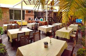 Antigua Inn Hotel 레스토랑 또는 맛집