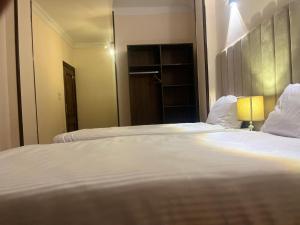 Letto o letti in una camera di King Badr pyramids