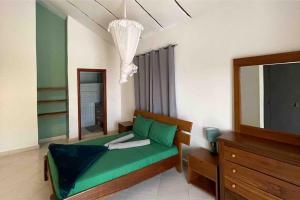 En eller flere senge i et værelse på Belle villa saly + 18 billeder