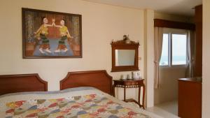 Postel nebo postele na pokoji v ubytování Fulay Hotel