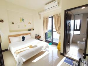 Krevet ili kreveti u jedinici u objektu Henchun Hope Homestay