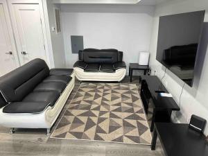 A television and/or entertainment centre at The Classy Suite - 2BR with Free Parking