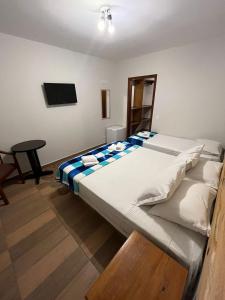 Ein Bett oder Betten in einem Zimmer der Unterkunft Villa Rural