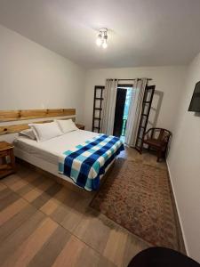 Ein Bett oder Betten in einem Zimmer der Unterkunft Villa Rural