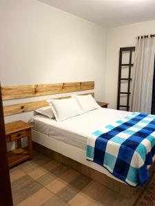 Ein Bett oder Betten in einem Zimmer der Unterkunft Villa Rural