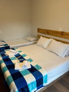 Ein Bett oder Betten in einem Zimmer der Unterkunft Villa Rural