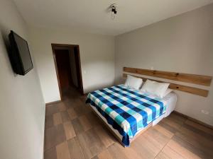 Ein Bett oder Betten in einem Zimmer der Unterkunft Villa Rural