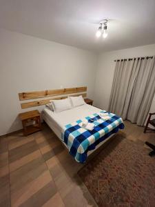 Ein Bett oder Betten in einem Zimmer der Unterkunft Villa Rural