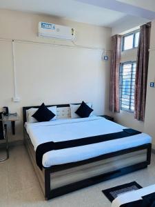 Posteľ alebo postele v izbe v ubytovaní HOTEL CKD