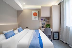 Voodi või voodid majutusasutuse Yue Lv Hotel toas
