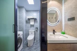 Koupelna v ubytování Yue Lv Hotel + 26 fotografií