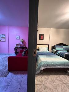 Postel nebo postele na pokoji v ubytování Sawasdee hatyai City House