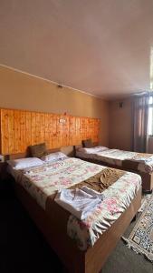 Postel nebo postele na pokoji v ubytování HOTEL IVORY