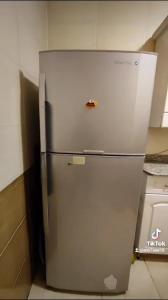 a refrigerator in a kitchen with its door open at شقه فندقيه بالإسكندرية in Alexandria