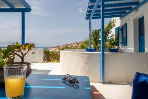 A balcony or terrace at Iliovasilema VILLAGE