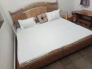 Postel nebo postele na pokoji v ubytování BHANWAR VILLA HOME STAY + 10 fotografií