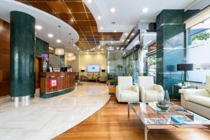 TV a/nebo společenská místnost v ubytování Hotel Regio Cádiz